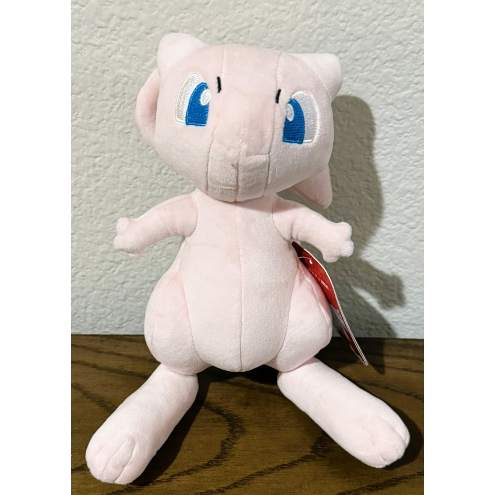 Pokémon Mew Pink Plush 8" Stuffed Animal Pink w Blue Eyes Curled Tail NWT